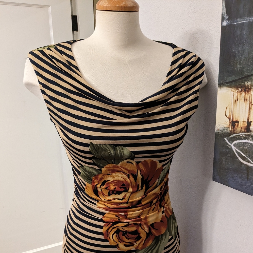 Sexy striped dress with flowers and side rushing.